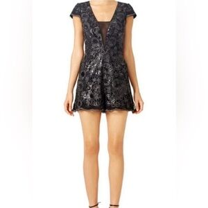 Badgley Mischka Corrine Black and Silver Floral Romper, size 6.   Worn once